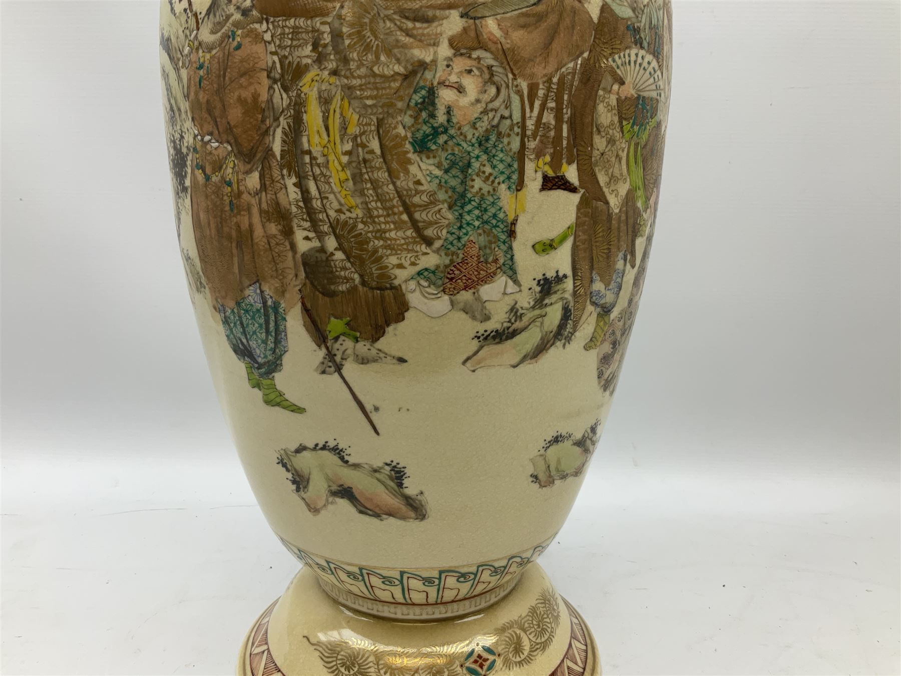 Pair early 20th Century Japanese floor vases of ovoid form, painted with warriors and elders within geometric designs and gilding, H61cm