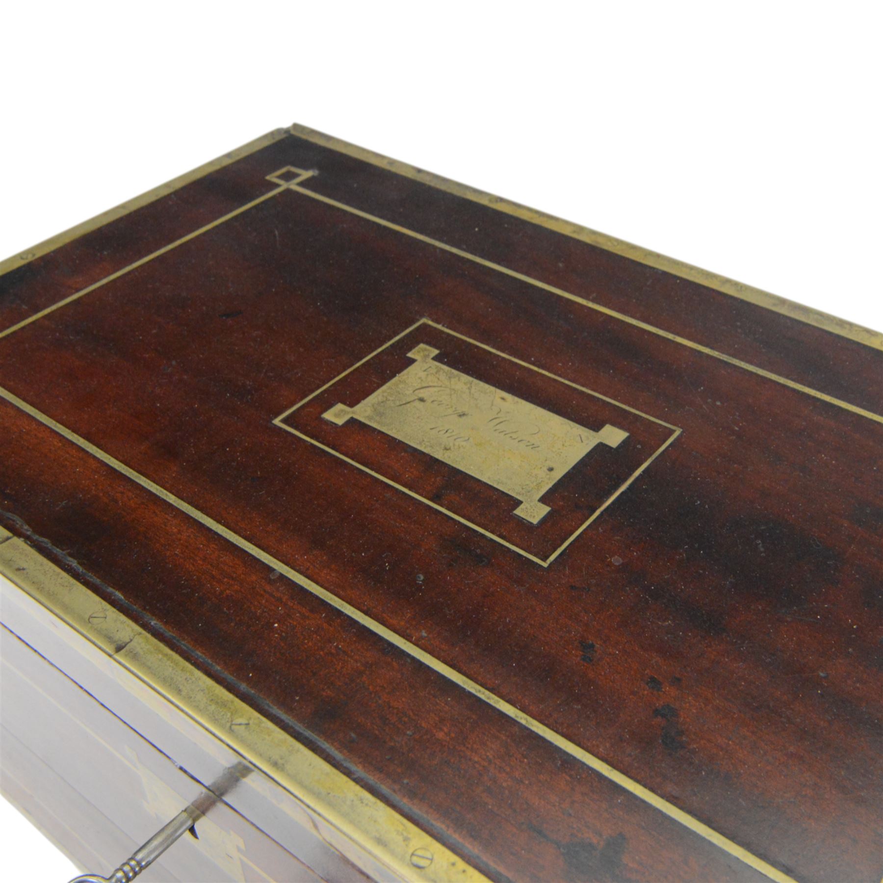 19th century brass bound mahogany writing slope with twin drop carry handles to sides, the hinged cover opening to reveal a  gilt tooled burgundy leather slope and compartmented interior, H22xm W50.5cm D30cm