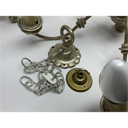 Siz branch silvered chandelier, decorated with acanthus leaves and putti, together with two matching three branch wall sconces, chandelier D65cm