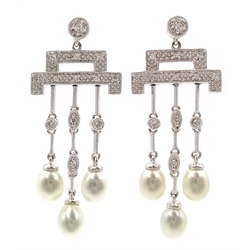  Pair of 18ct white gold Art Deco style pearl and diamond pendant ear-rings, stamped 750  