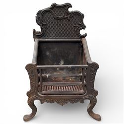 Cast iron fire grate with shaped front cab legs