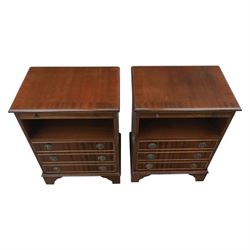 Pair of mahogany bedside lamp tables, fitted with slide, open shelf and three drawers