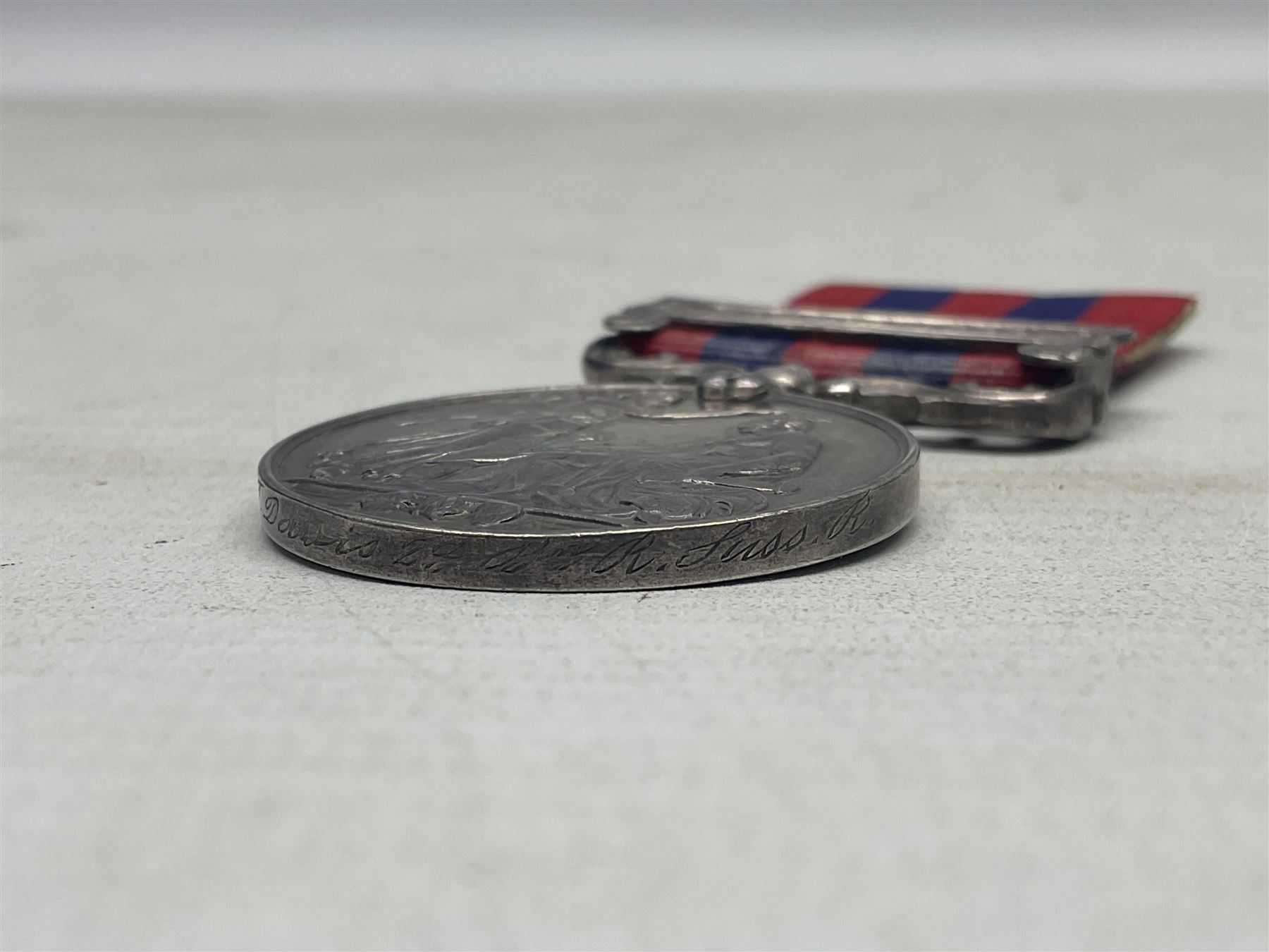 Victoria India General Service Medal with Hazara 1888 clasp awarded to 39 Pte. J. Davis 2d. Bn. R. Suss. R.; with card stiffened ribbon