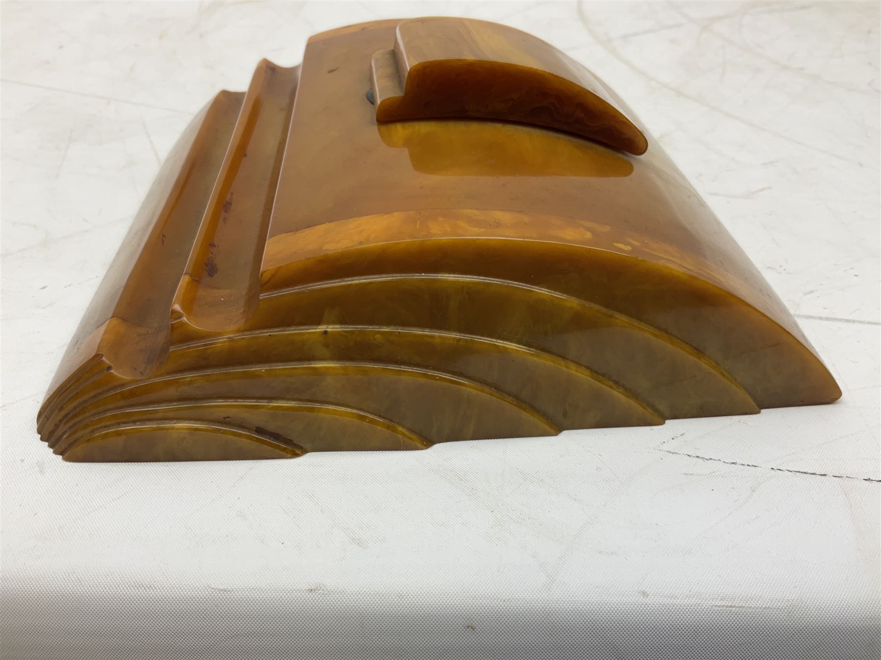 Art Deco butterscotch amber bakelite desk stand , with two pen rests