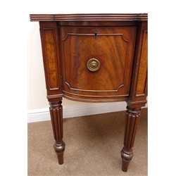  Regency break front figured mahogany sideboard, moulded top, single frieze drawer flanked by two convex cupboards, turned lobe tapering supports, W175cm, H92cm, D68cm  