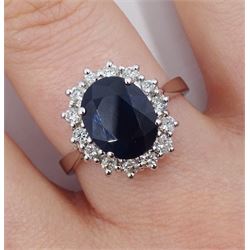 18ct white gold sapphire and diamond cluster ring, hallmarked, sapphire approx 3.55 carat, total diamond weight approx 0.25 carat