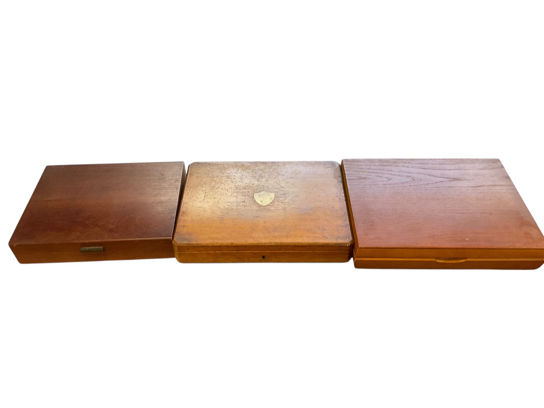 Three cased canteens of cutlery, including a set of fish knives 