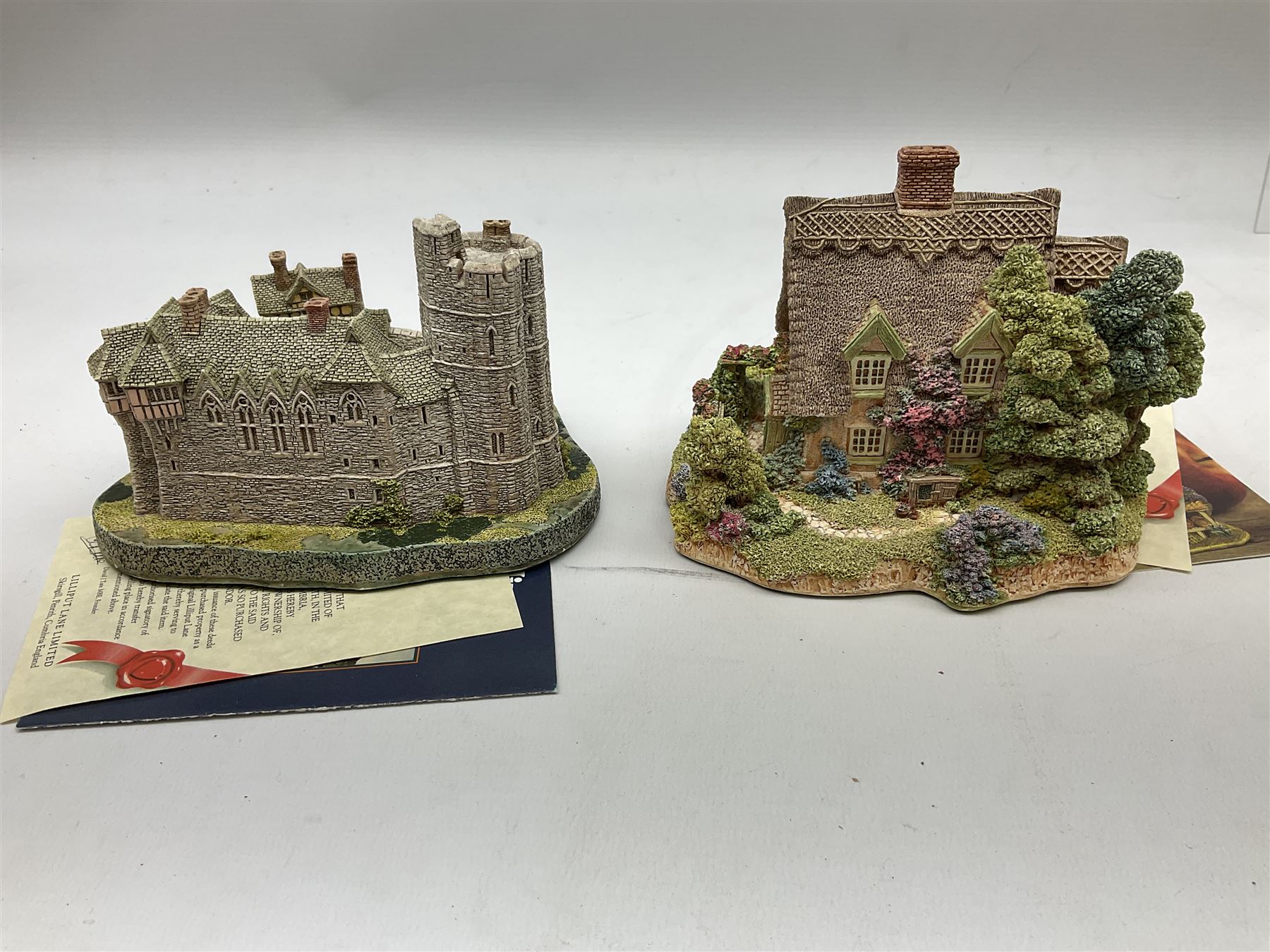 Four limited edition Lilliput Lane cottages, comprising Stockwell Tenement from the Scottish collection, Forget-Me-Not, Cotman Cottage and Stokesay Castle, all boxed with deeds
