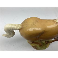 Beswick figure of cantering Palomino horse on base model no 1374, with impressed and printed mark beneath, H18cm