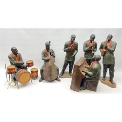 A group of six large composite Jazz Band figures, to include pianist, double bass player, drummer, saxophone player, singer, etc., tallest H57cm. 