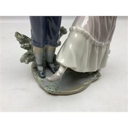 Lladro figure, One, Two, Three, modelled as young boy and girl dancers practicing steps, sculpted by Jose Roig, with original box, no 5426, year issued 1987, year retired 1995, H26cm