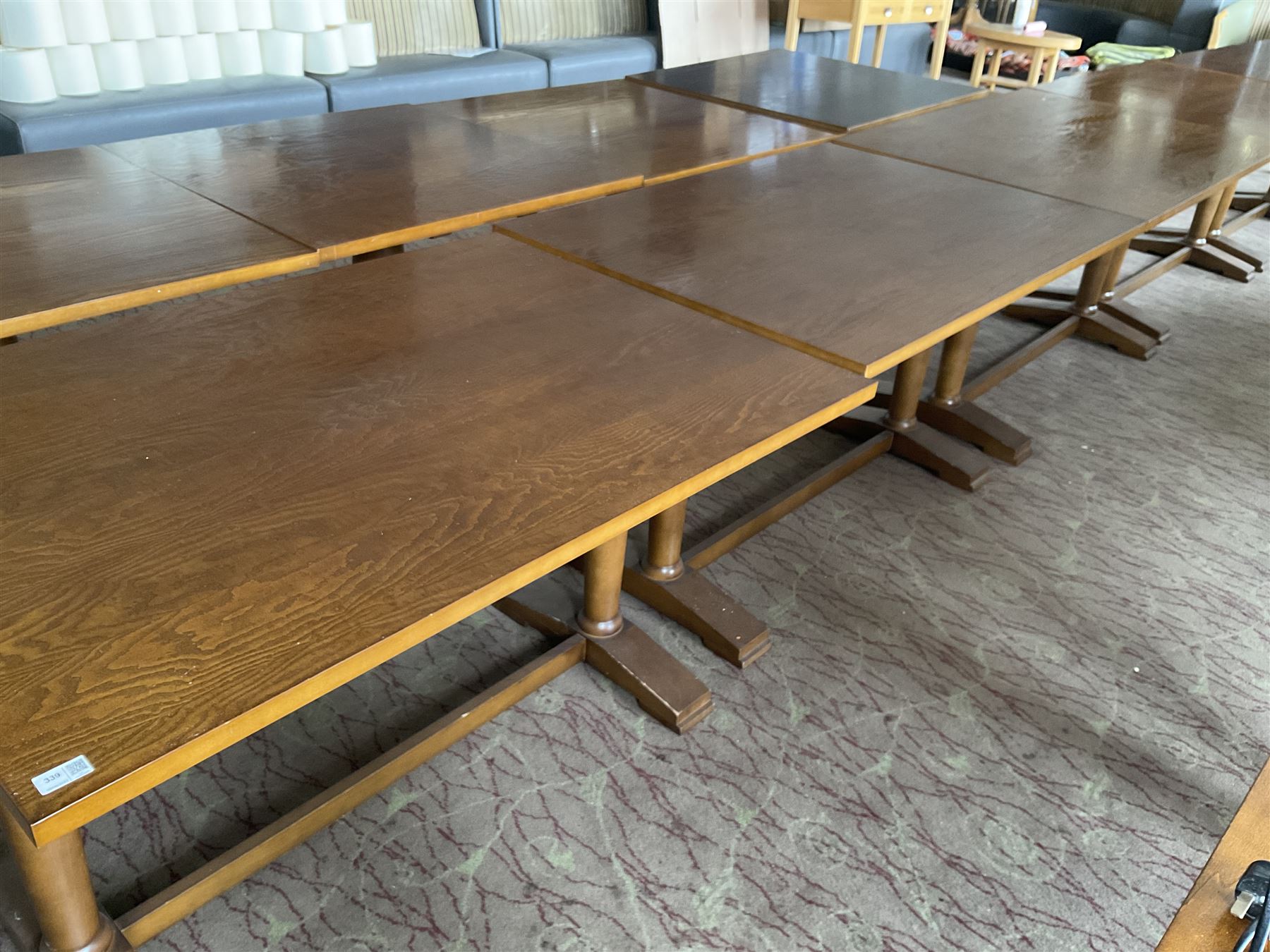 Three  rectangular walnut finish dining tables - LOT SUBJECT TO VAT ON THE HAMMER PRICE - To be collected by appointment from The Ambassador Hotel, 36-38 Esplanade, Scarborough YO11 2AY. ALL GOODS MUST BE REMOVED BY WEDNESDAY 15TH JUNE.