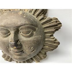 Carved pine mask of the sun, probably late 17th/early 18th century, originally a cresting, bearing Christie's lot labels, D20cm

Provenance 
Lot 161, Christopher Howe - The First Twenty Years, Christie's. 24th March 2004

