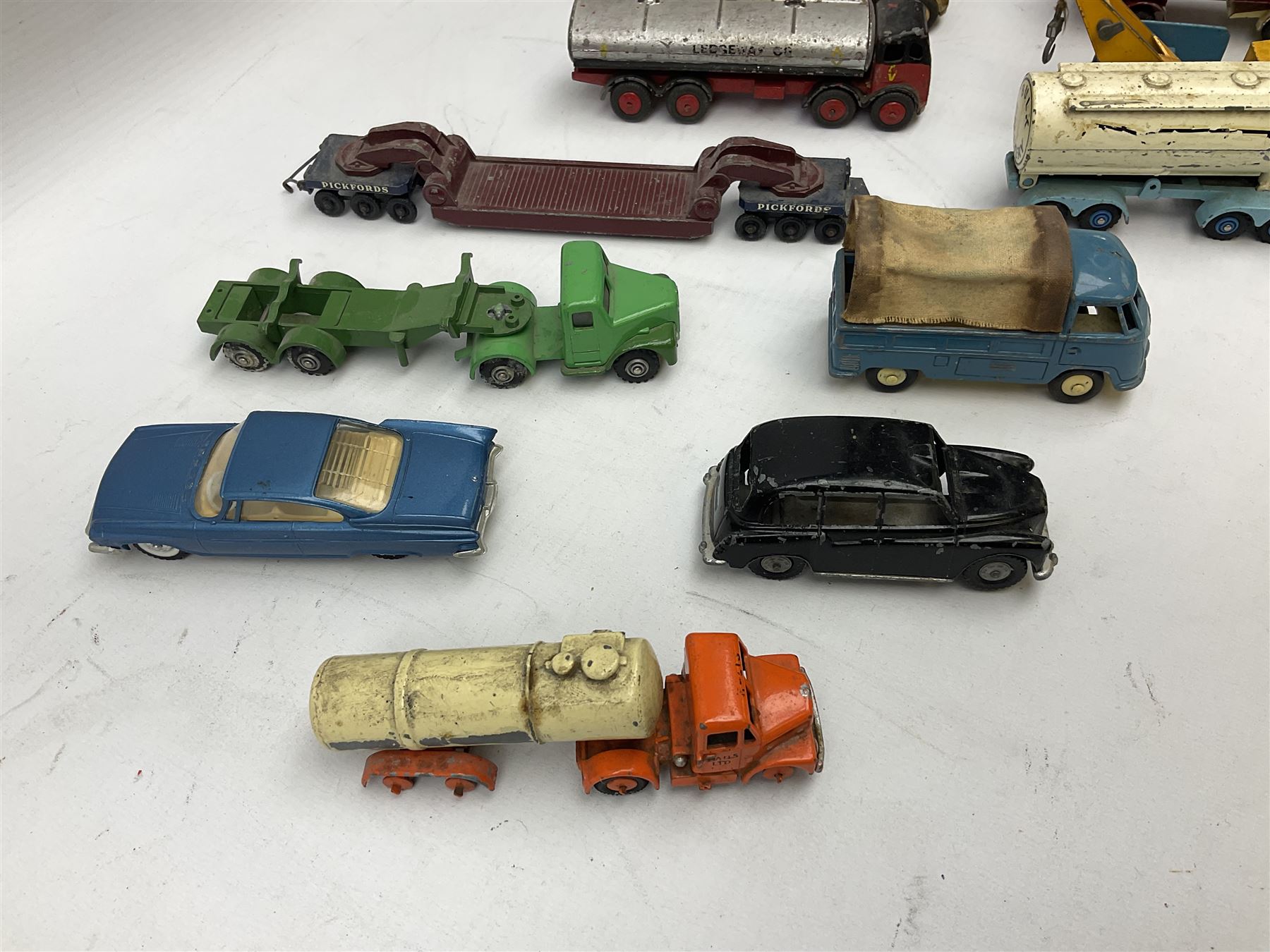 Budgie - five unboxed and playworn die-cast commercial vehicles comprising Scammell Scarab with BR Semi-Trailer, Volkswagen Pick-Up, Towing Tender & Breakdown Truck, Highwayman Transporter No.326 and Routeman Pneumajector No.322; Morestone G&E Wood open lorry and Petrol Tanker; nine early Lesney models; and small quantity of others by various makers