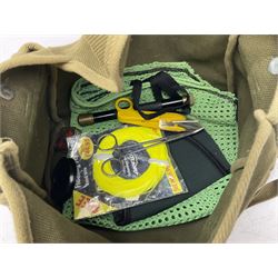 Fishing tackle, including 'The Gnat' fly reel, Alvey 4 1/2 inch reel, Paramount 4 1/2 inch reel, other fishing reels, various fishing flies and other similar items in a carry bag 