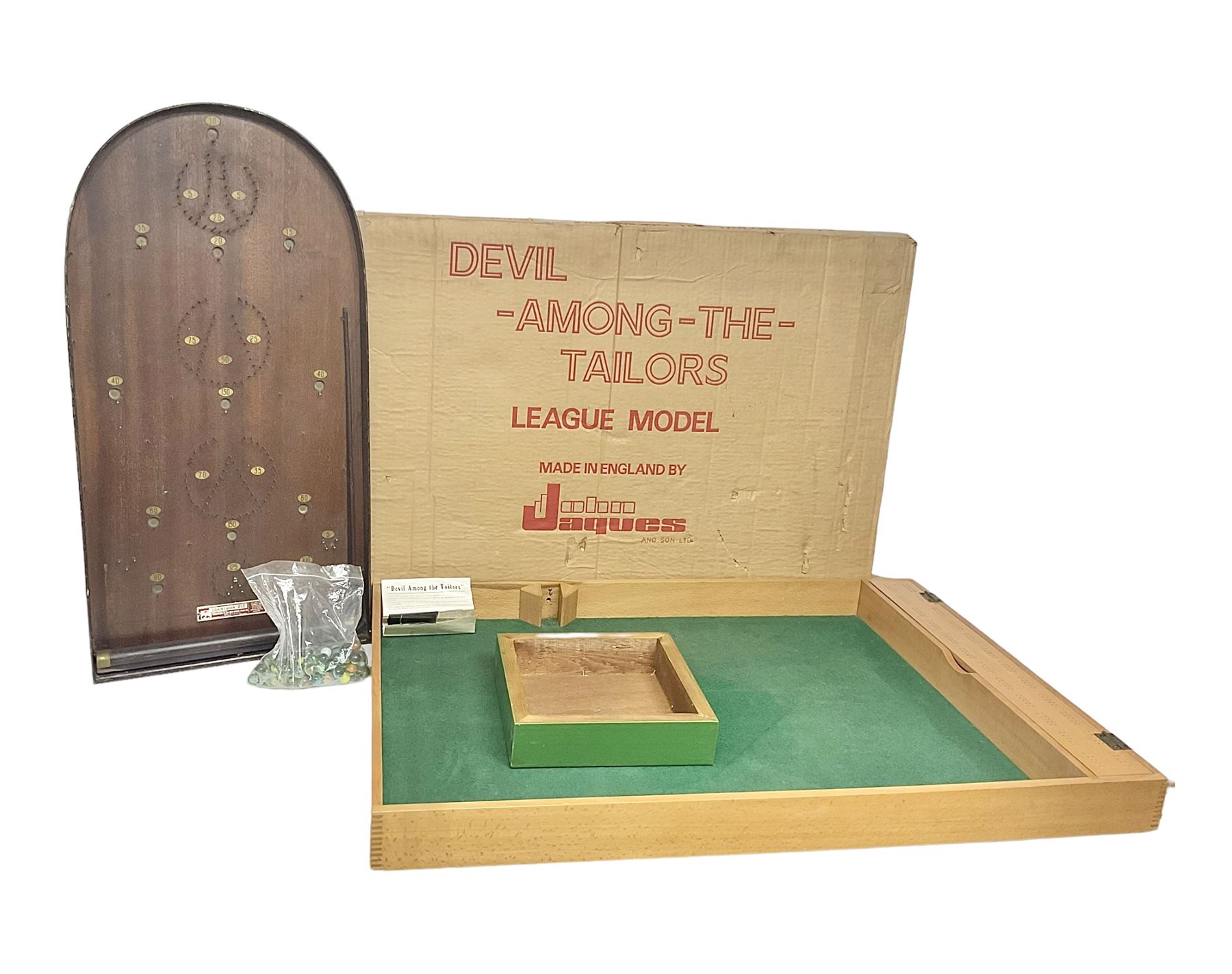 John Jaques and Son ‘Devil Among the Tailors’ wooden vintage skittles game, missing pole and ball, with instruction manual and original box; and a Corinthian Bagatelle board with marbles and push stick 