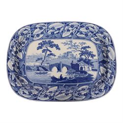 Two 19th century blue and white transfer printed pottery meat plates, the first by Don Pottery decorated in the Port of Alicata Italian and Sicilian views pattern, L38cm the second decorated in a Wild Rose type pattern variant, L37.5cm