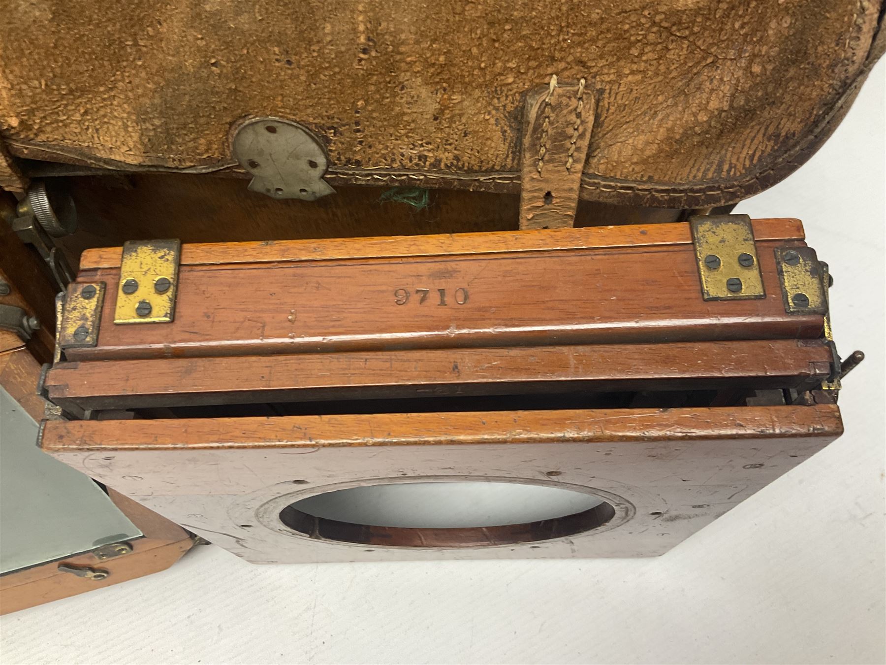 Collation of folding plate cameras of various sizes folding plate in mahogany and lacquered brass, together with camera plates and slides
By vendors repute some slide are from the Gandolfi workshop