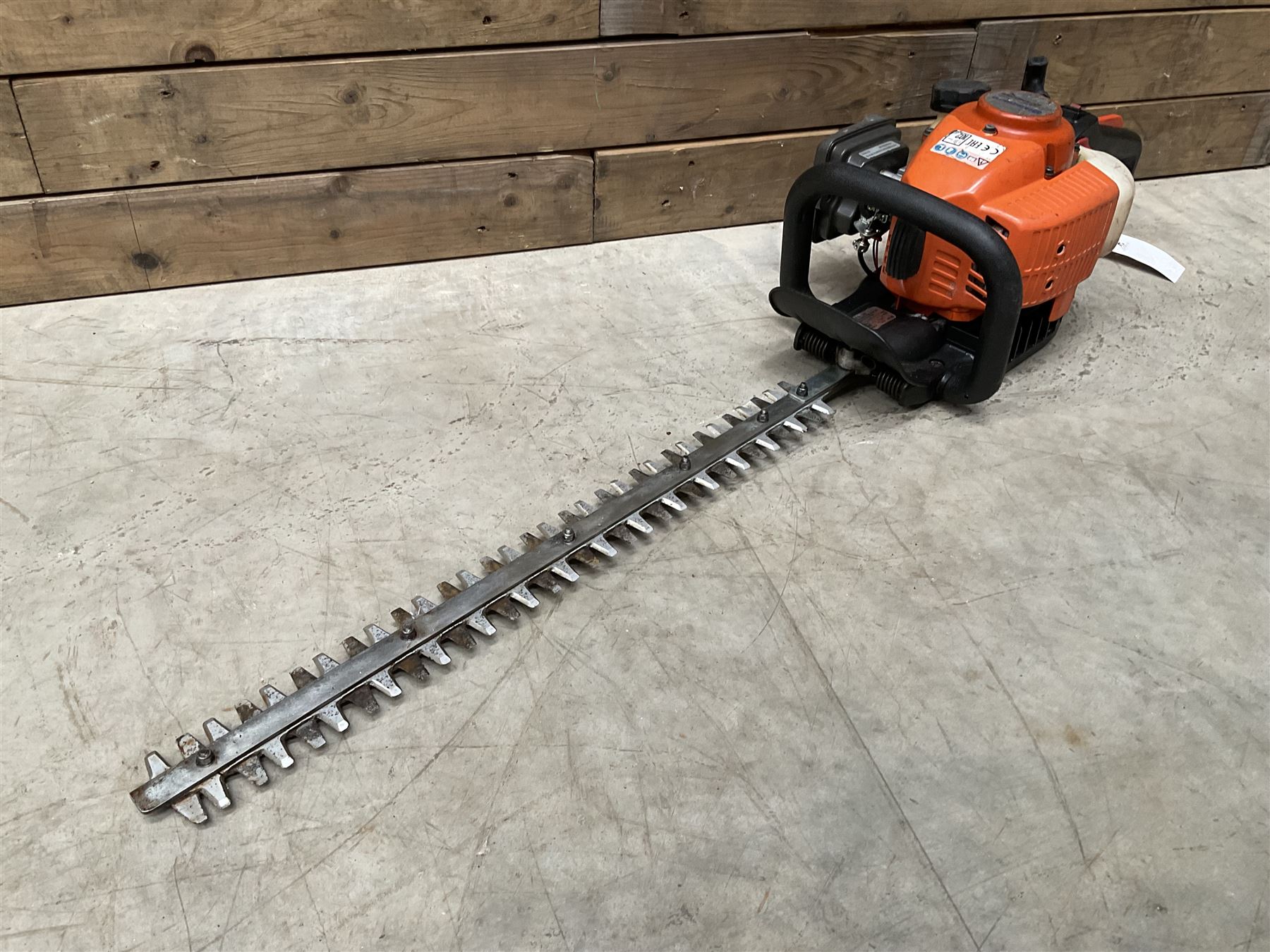 Husqvarna 141 petrol chainsaw and a Husqvarna 226HD75S petrol hedge cutter