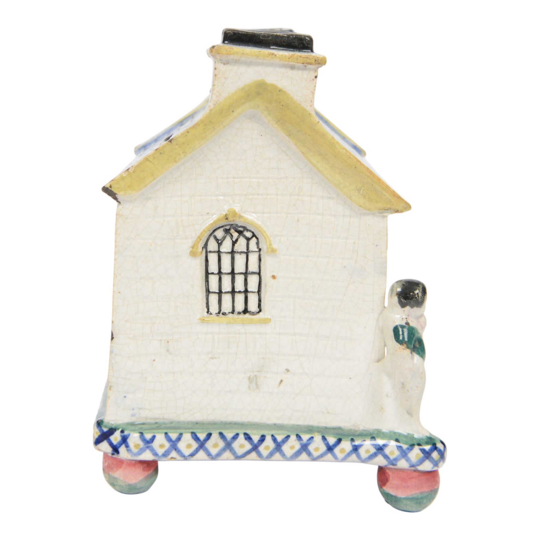 Mexborough Prattware Wesleyan Chapel Money Box, 1848, typically modelled as a chapel with putti to the front corners, on ball feet, inscribed  to the front Emma Sutton Bampton June 18 1848, H17cm, L15cm