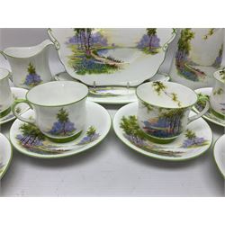 Aynsley Bluebell Time 'As Supplied to the Queen' tea service, comprising hot water jug, six teacups and saucers, milk jug, two cake plates and tow trinket dishes  