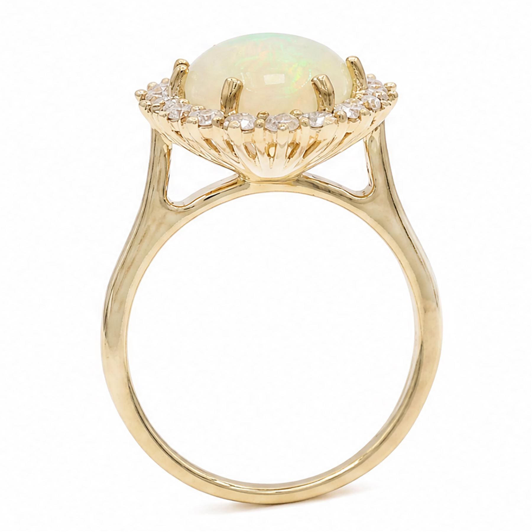 9ct gold opal and diamond cluster ring, single cabochon cut opal of approx 1.95 carat, surrounded by eighteen round brilliant cut diamonds, total diamond weight approx 0.80 carat
