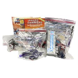 Four 1980sTransformer G1 - Optimus Prime 1984; DinoBot Sludge (Diplodocus) 1984; Cyclonus 1986; and Runamuck 1986; with paperwork; seven Bandai Robo Machines Robots/Transformers; almost fully stocked Panini Sticker album; two annuals; three comics; two posters; and Ladybird story book