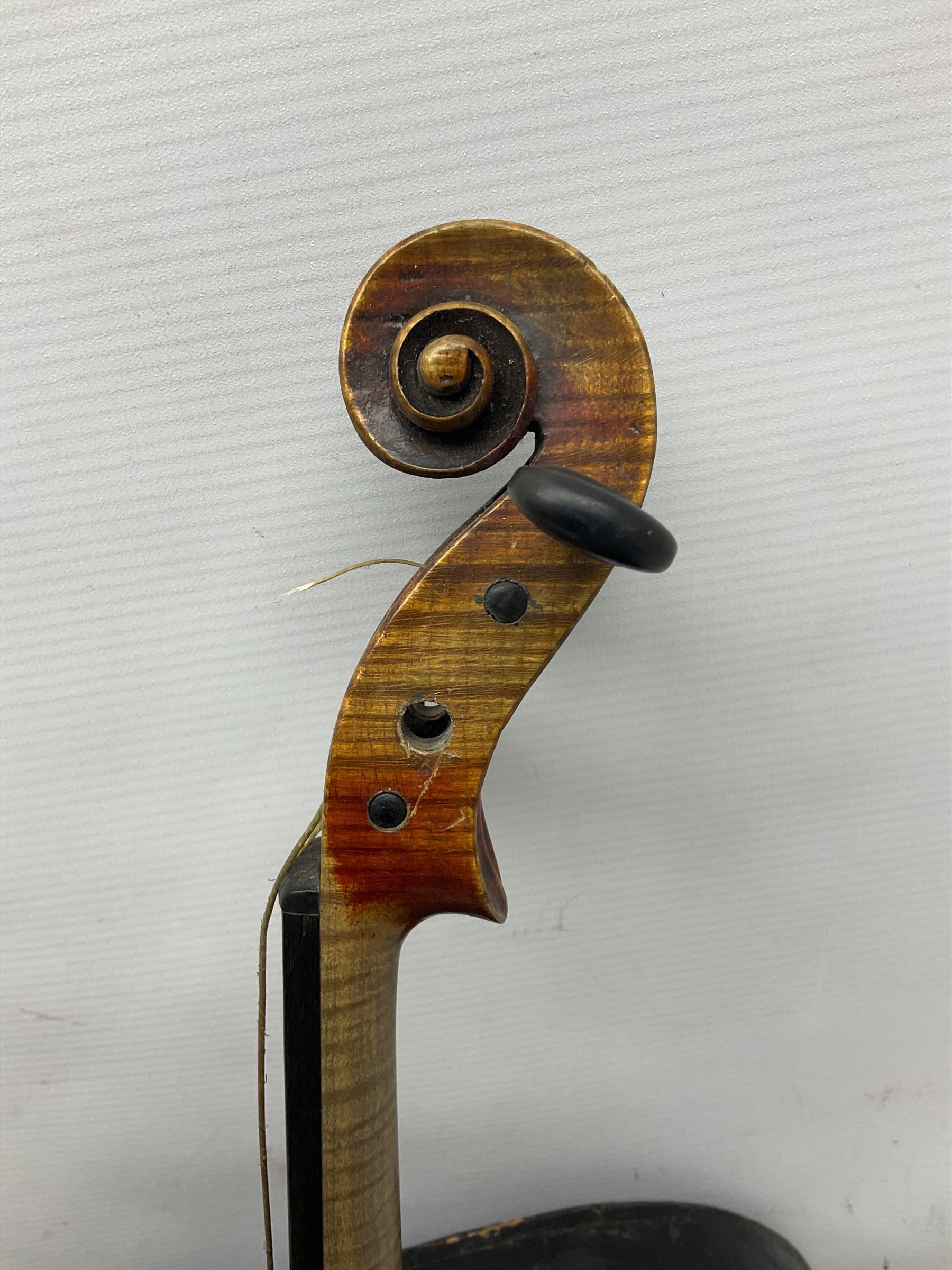 Late 19th century French three-quarter size 'Conservatory' violin with 34cm two-piece maple back and ribs and spruce top, the peg box inscribed 'Conservatory Violin Straduari', bears label 'Antonius Stradiuarius Cremonensis Faciebat Anno 1721' L55.5cm overall; in ebonised wooden 'coffin' case