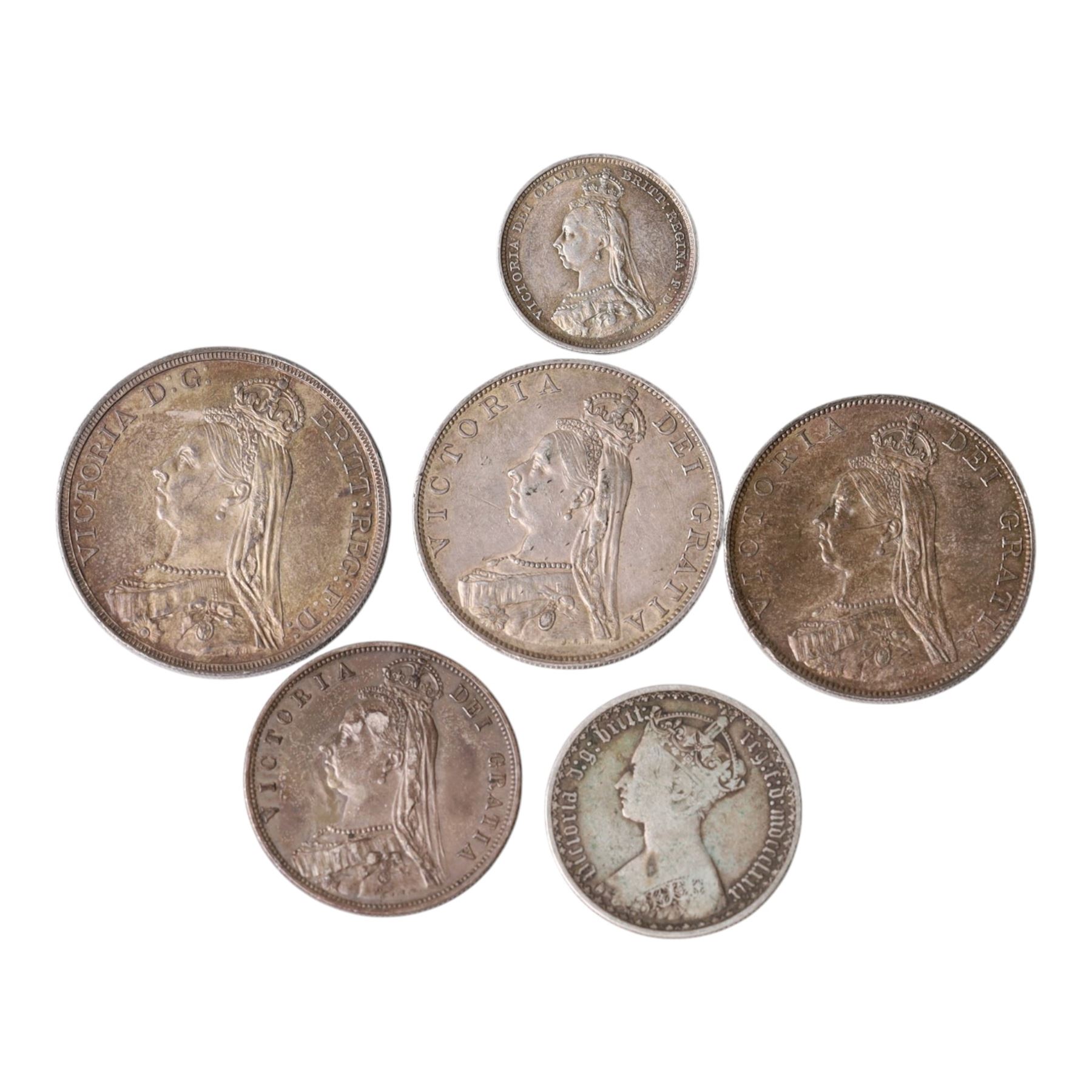 Six Queen Victoria silver coins, comprising 1887 crown, 1887 double florin, 1887 half crown, 1879 'Gothic' florin, and 1887 shilling