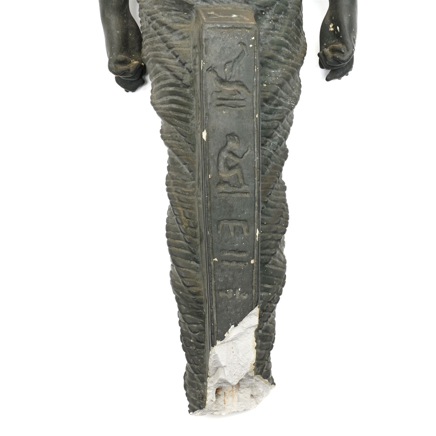 Neoclassical 19th century plaster pedestal, the base cast as two straining Atlantes on a naturalistic rocky base, unmarked, excluding fittings H65cm; together with a set of three plaster figures, cast as Egyptian ladies in headdresses and draped in cloth, by John Dominic Giannelli (1775-1841), the reverse with hieroglyphic decoration, inscribed 'Published as the Act Directed By J D Giannelli 1805', possibly corresponding attachments for the aforementioned pedestal, H62cm 
Provenance: property of a Nobleman