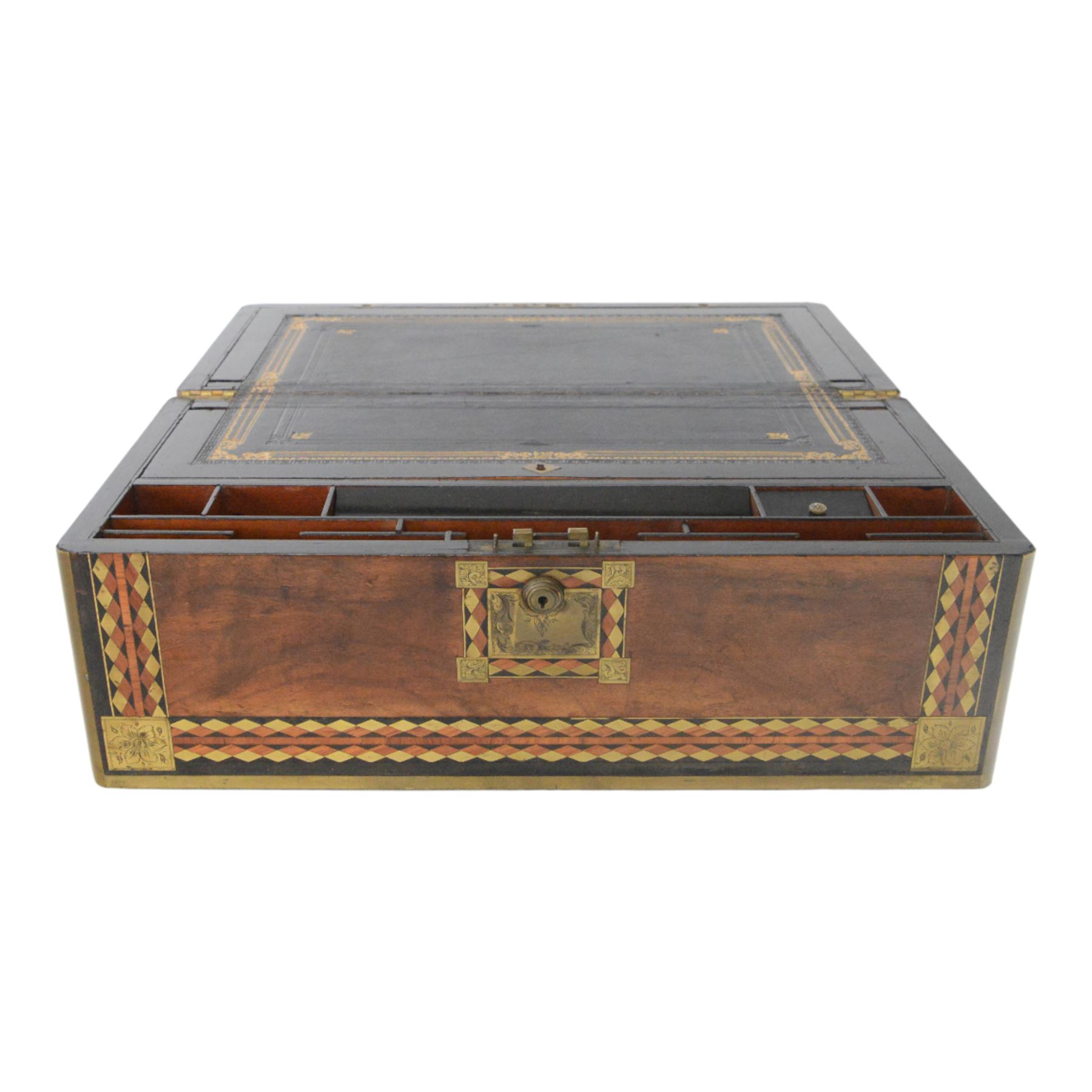 19th century rosewood writing slope, of rectangular form, the hinged cover and front with inlaid foliate engraved brass corner panels, and inlaid marquetry and brass diamond borders, the cover with foliate engraved and named central plaque, opening to reveal a fitted and compartmented interior with gilt tooled black leather slope, H21cm W50cm D28.5cm