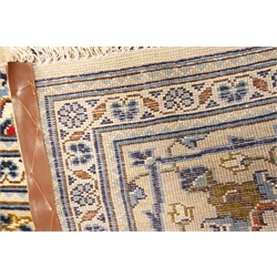  Persian Kashan ivory ground rug, blue floral design with repeating border, 349cm x 246cm  