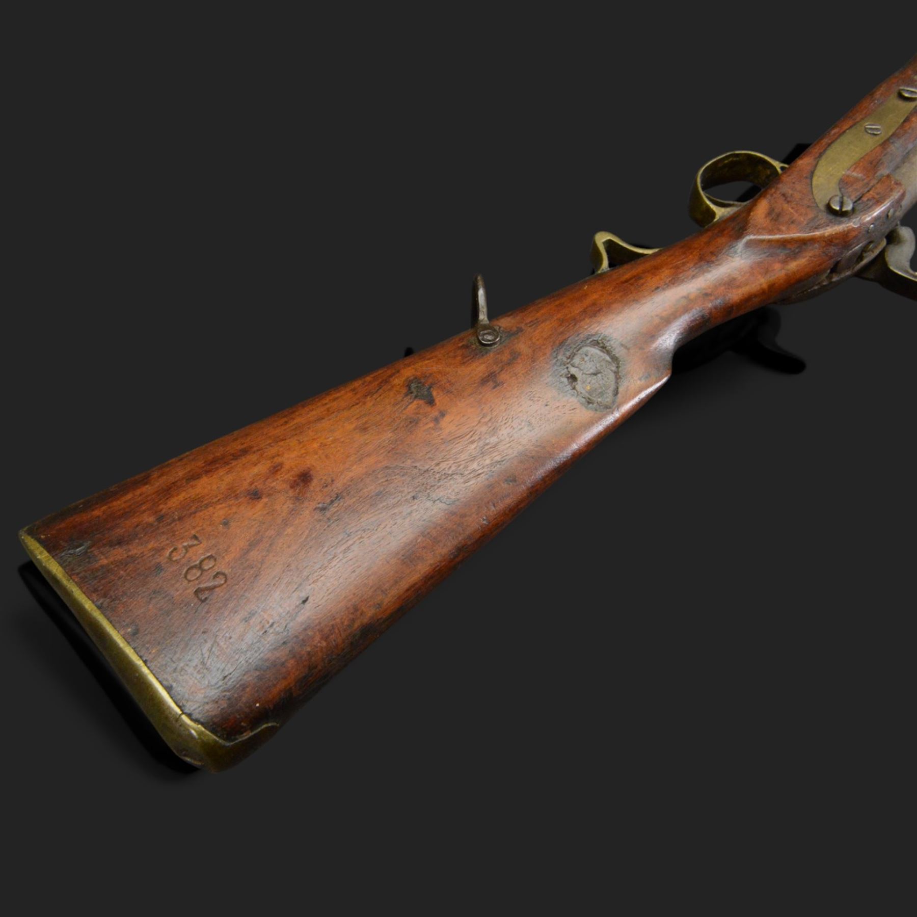 Percussion musket, the 70cm barrel with ramrod under, full walnut stock, with two sling swivels, overall L110cm
Sold as an exempt item under Section 58 (2) of the 1968 Firearms Act, to be held as a curiosity or ornament