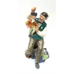 A Royal Doulton figure, The Puppetmaker HN2253 
