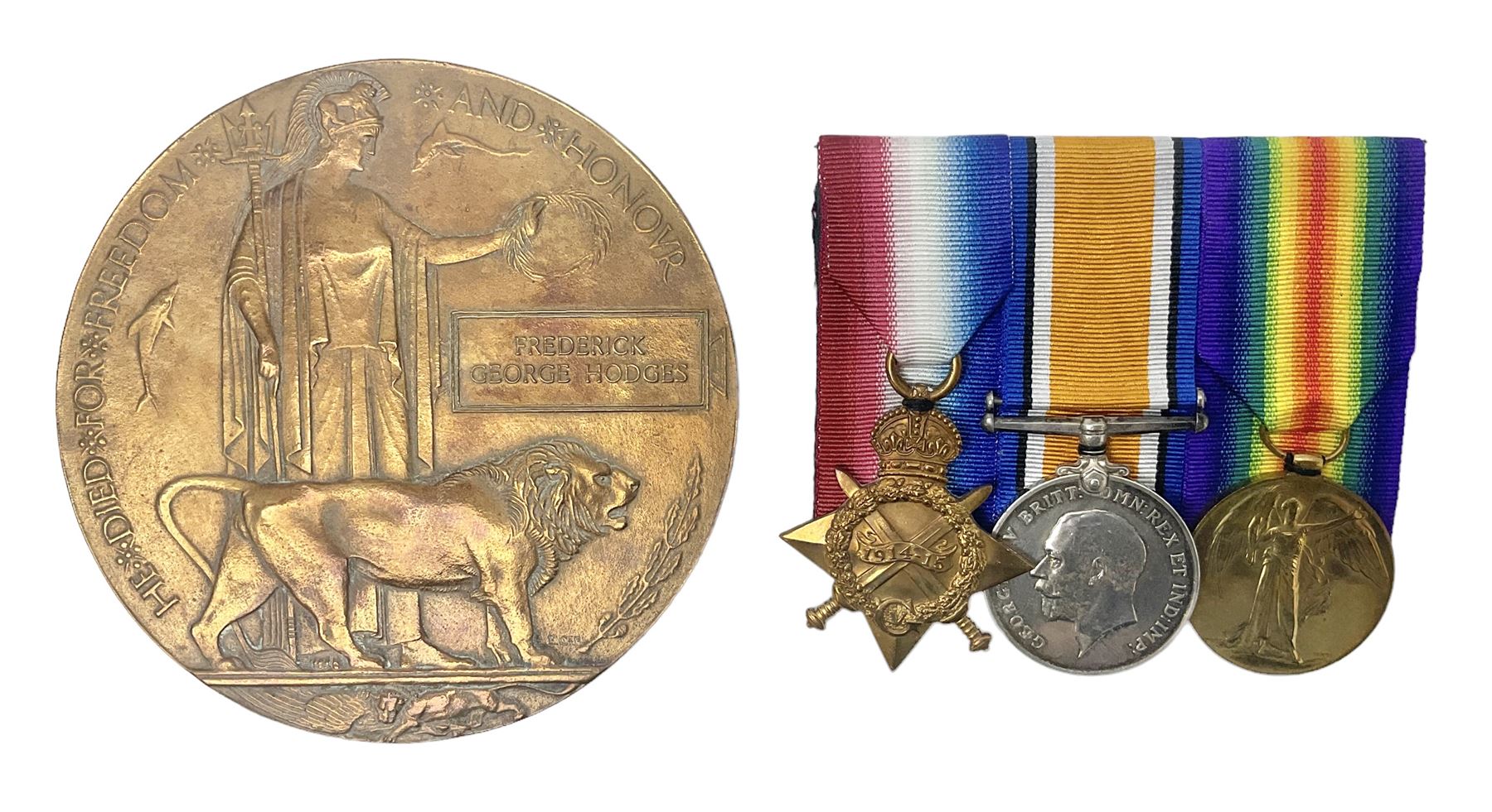 WW1 KIA group of three medals comprising British War Medal, 1914-15 Star and Victory Medal together with bronze Memorial Plaque named to G-13 Pte. F.G. Hodges R. Suss. R.; with ribbons; displayed on modern board for wearing; some biographical details