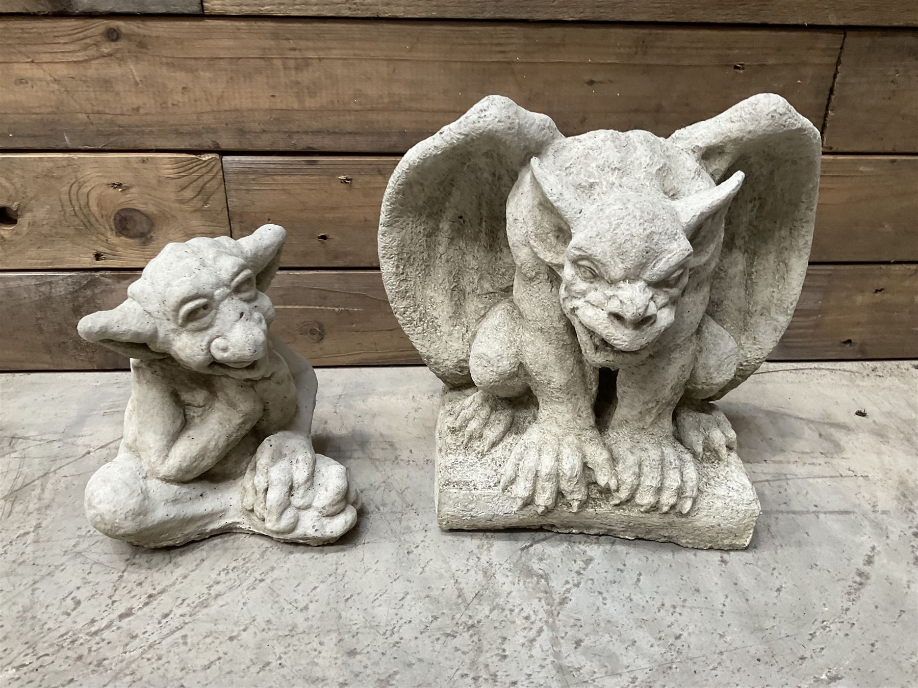 Composite garden Buddha figure and two gargoyle figures (3)