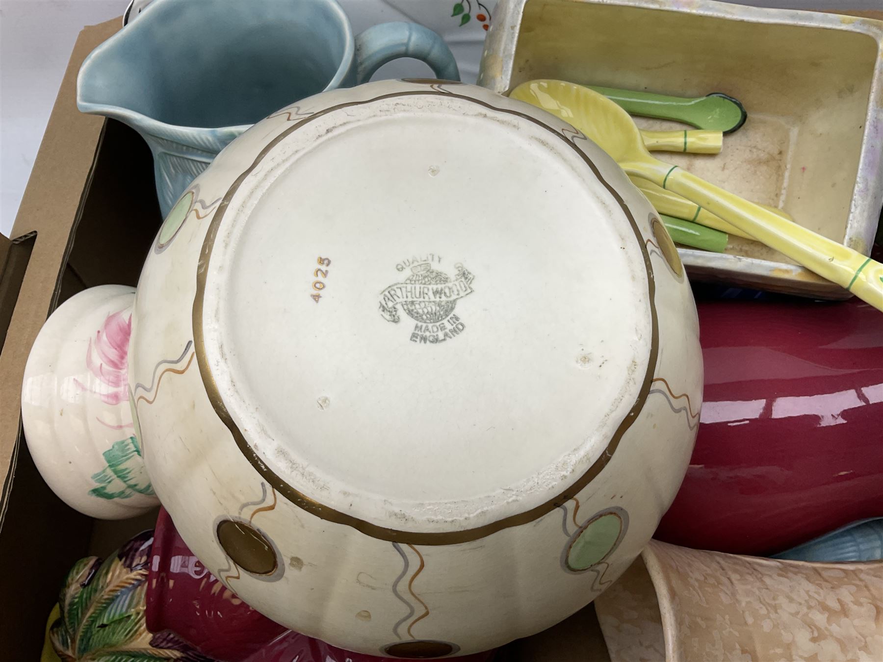 Two Beswick jugs decorated with palm trees, together with matching wall pockets, and similar ceramics, together with six Shelley dishes  