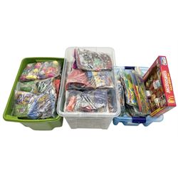 Large quantity of Mcdonalds toys in thre