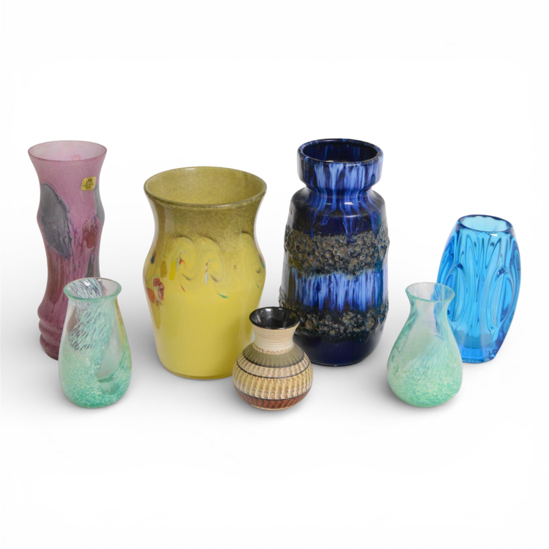 Strathearn glass vase, decorated with multiple swirls against a yellow ground, together with Rudolf Schrötter, blue glass Bullet vase and two other vases 