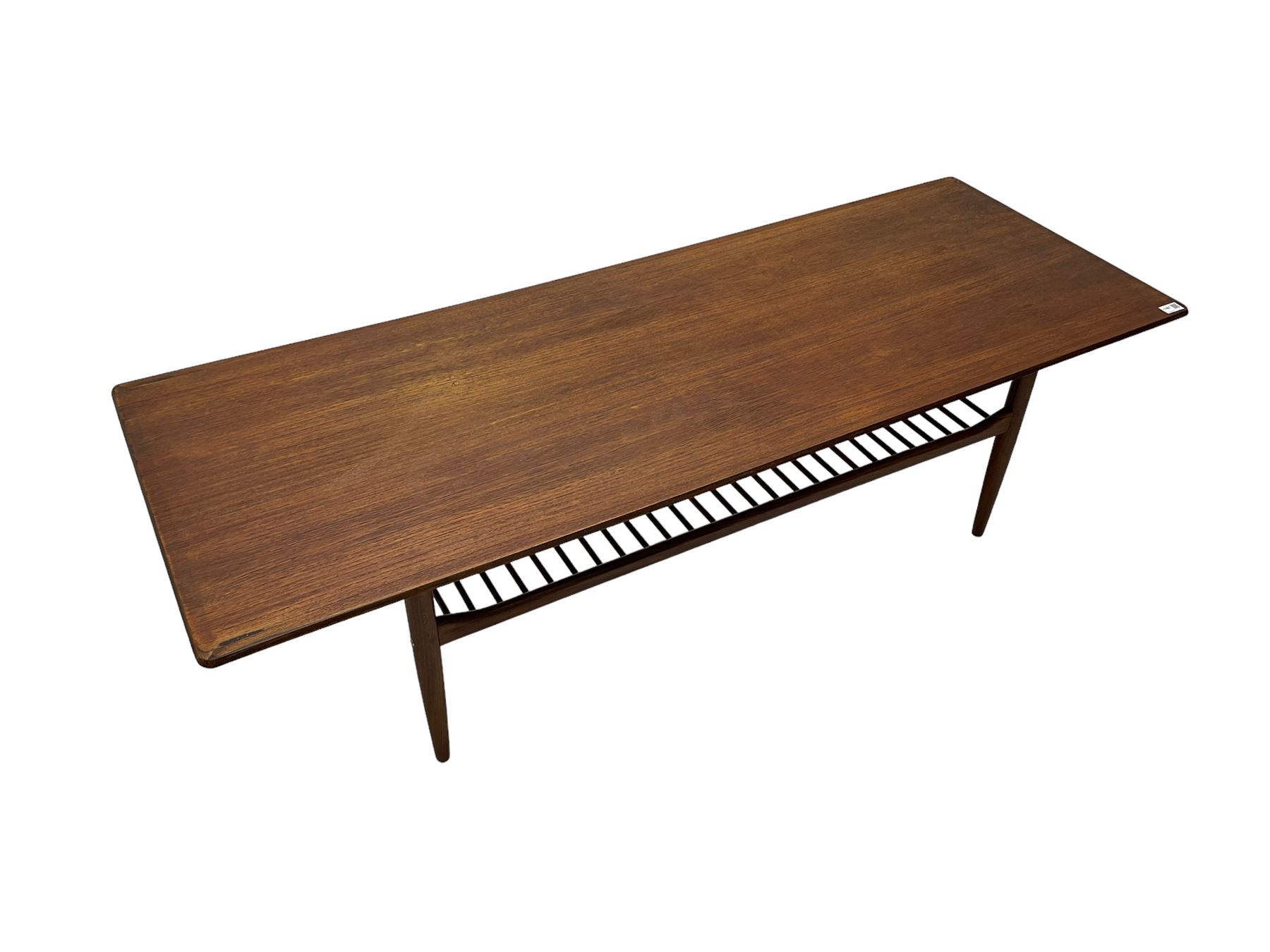 Kofod Larsen for G-Plan - mid-20th century  teak coffee table, rectangular top over spindle slatted undertier, raised on tapering supports 