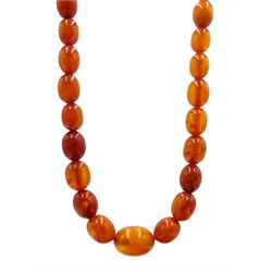  Graduating amber bead necklace 80cm and a coral necklace  