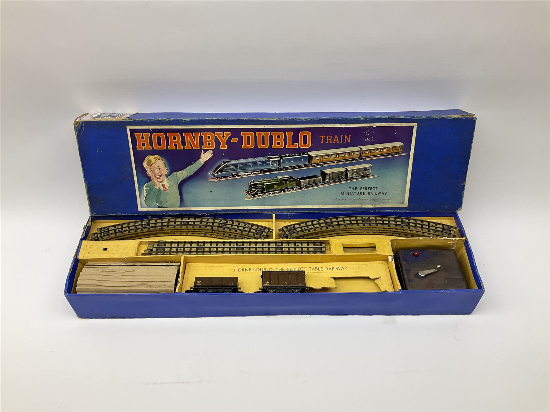 Hornby Dublo - three-rail EDG7 Tank Goods Train set with LMS black 0-6-2 Tank locomotive No.6917, two wagons (lacking brake van), quantity of straight and curved track and controller, in earlier long box.