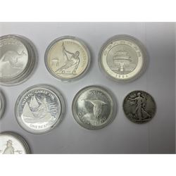 United States of America 1896 Morgan one dollar coin, 1893 'Columbian Exposition' commemorative half dollar, 1945 standing Liberty half dollar, Queen Elizabeth II Australia 1993 one ounce fine silver dollar, Canada 1967 and 1995 one dollar coins etc (15)