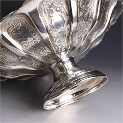 Edwardian silver swing handled basket, of circular form with shaped rim and engraved floral and foliate decoration, with know design swing handle and upon circular stepped pedestal, hallmarked J Sherwood & Sons, Birmingham 1901, H9cm, D22cm