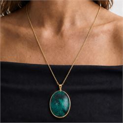 9ct gold azurite pendant necklace, bezel set oval cut azurite, on a gold belcher link chain necklace