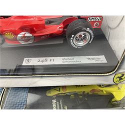Five Mattel Hot Wheels 1:18 scale die-cast racing cars - Ferrari 248F1 Michael Schumacher, Renault F1 Team R25 Fernando Alonso, Williams F1 Team Williams FW28 Mark Webber, Jordan 199 Damon Hill and Williams F1 Team BMW; all boxed (5)