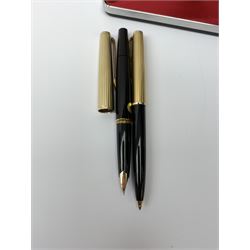 A Montblanc 227 fountain pen and 287 ballpoint pen set, circa 1970, each with black resin body, reeded gold plated cap, and white star emblem detail, the fountain pen with piston filling mechanism and nib marked 585, the ballpoint with lever action, in maker's case. 