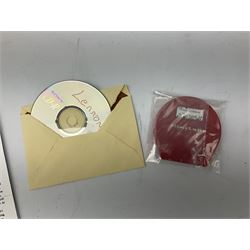 John Lennon interview recording conducted by John Hill student of Hull University on the 16th October 1964 at the A.B.C. Theatre Hull on behalf of the university newspaper 'Torchlight'. The interview lasts eight and a half minutes. It catches John in an upbeat breezy mood answering questions about the following topics: the song writing process ('sometimes you get an idea ....I dunno....my left leg.... and then write about that....'), recording (.... 'they just say - you're recording on such and such a date and they hope we turn up with some good songs written ....'), an alternative career path (.... 'I'd probably just have been a lay-about....'), failing at college (....'some other lads did my exams for me ....'), reading matter ( Clockwork Orange, Alice in Wonderland), his books of prose, tastes in music, the Blues, The Rolling Stones, being a Beatle vis-a-vis anonymity ('Whatever I'd be I'd choose to be rich .... who wants to walk down the street?').
The interview was recorded on 1/4 inch Emitape on a Fi-Cord Fidelity Recording machine. The reel-to-reel tape comes in its original Emitape plastic box and is accompanied by the Fi-Cord reel-to-reel machine on which the interview was originally recorded. Also included in this lot are a copy of the 'Torchlight' newspaper from 21st November 1964, two photographs of the interviewer with John Lennon (the interviewer is pictured to the left of John Lennon in the photograph in which John is signing a sketch) and one photograph of Paul McCartney with another reporter, the largest measures 12 x 16.5cm and a transcript of the interview. The recording is also accompanied by the original Fi-Cord tape recorder with microphone, four original 2v batteries and battery charger. The tape recorder has been adapted to take 3xAA batteries and the 2v battery charger is fitted with a standard UK 3-pin AC plug. The interview was recorded in the press room prior to the Beatles concert at the A.B.C. Theatre and is sold with copyright.