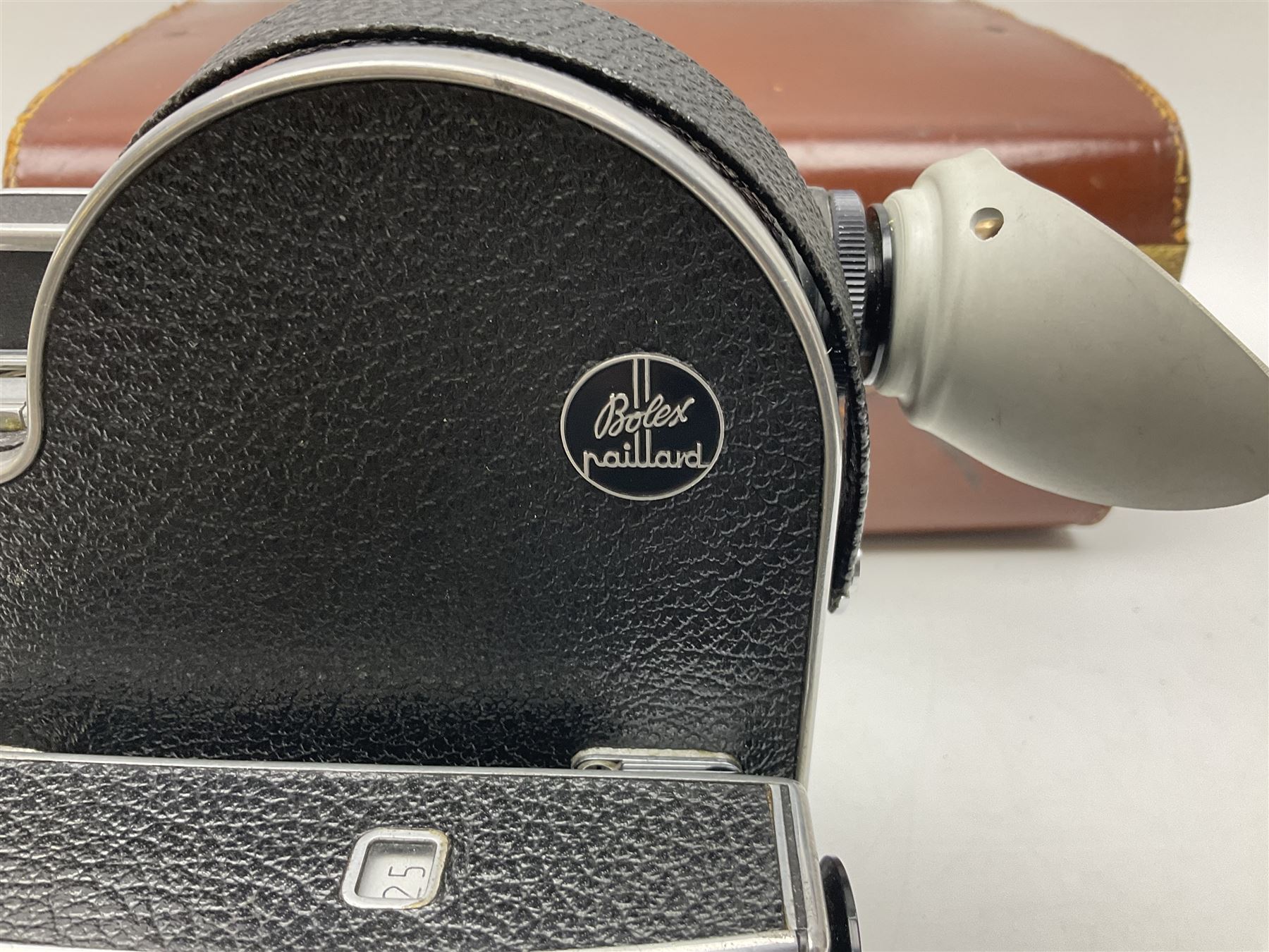 Paillard Bolex H8 RX4 cine camera body with turret for interchangeable lenses, serial no. 216071, with 'Macro Switar H8RX f1.4 36mm' lens, serial no.863406, 'Macro Switar H8RX f1.3 12.5mm' lens, serial no. 865770, 'Switar H8RX f1.6 5.5mm' lens, serial no. 937691 and RX fader, in fitted leather case