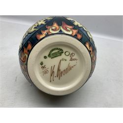 Moorcroft vase, decorated in Festive Flame pattern, limited edition 95/100, with printed mark and signed beneath, in original box, H16cm 